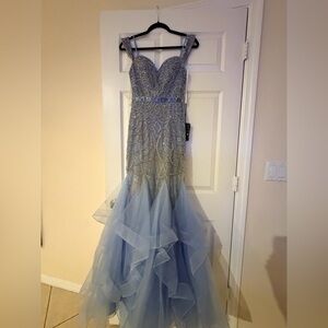 Lucci Lu blue mermaid gown.